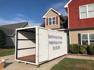 Sandhills portable stroage in front of house