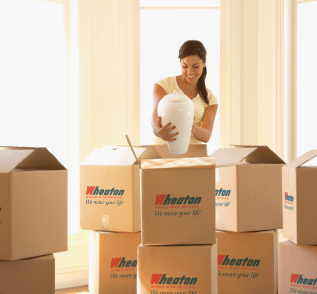 woman packing boxes