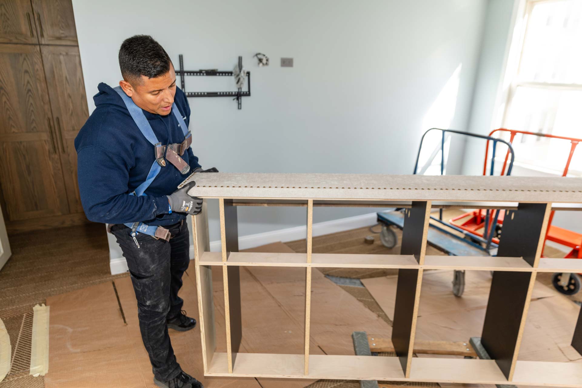 workers moving shelves